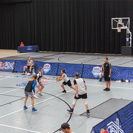 women playing 3 on 3 basketball